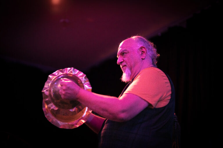 Michael Zerang performing on cymbals during HOT MESS! July 29, 2023. Photo by Erin Lynch