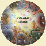 Puzzle House Logo by Tom Torluemke